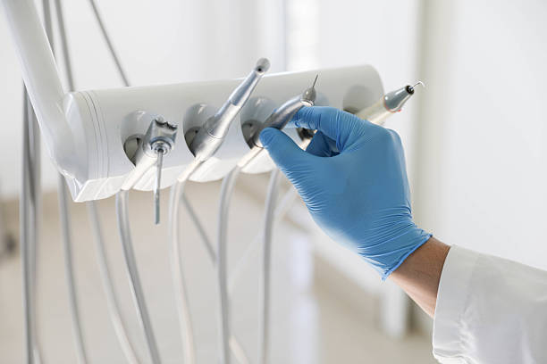 Professional Wisdom Tooth Removal technician working in Macon County County, NC